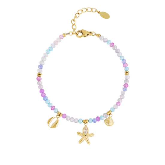 Edelstahl Armband mit Glas und Naturstein Perlen und goldenen Edelstahlanhängern im maritimen Design in pastelligen Lila und Blau Tönen.