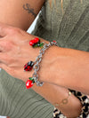 Edelstahl Armband mit bunten Glas Charms in Form von MArienkäffer, Zitrone, Kirsche und Erdbeere.