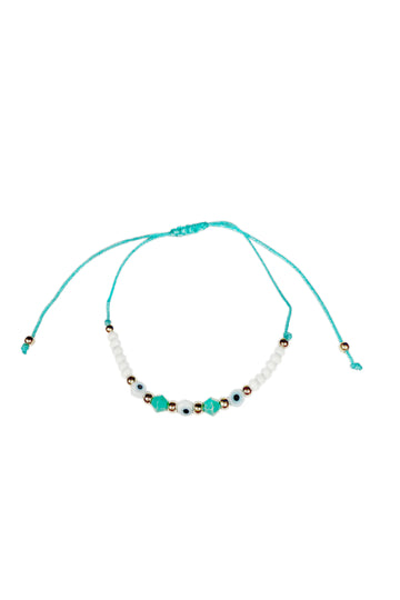 Türkises Stoffarmband mit goldenen, weißen und türkisen Perlen mit integriertem Nazar Auge.