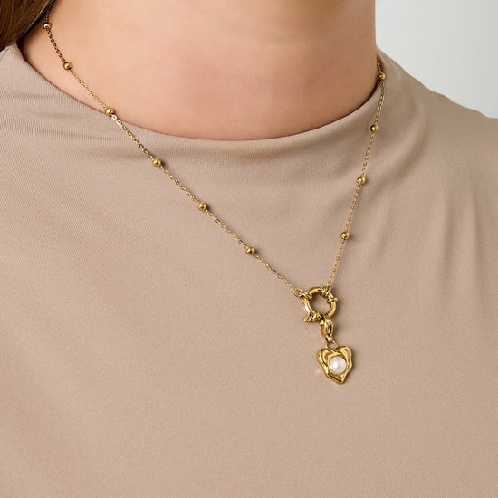 Feine goldenen Edelstahl Halskette mit einzelnen kleinen Kugeln und großem Ring, um Charms dran zu hängen.