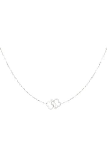 Silberne Edelstahl Halskette mit zwei verbundenen Kleeblättern.