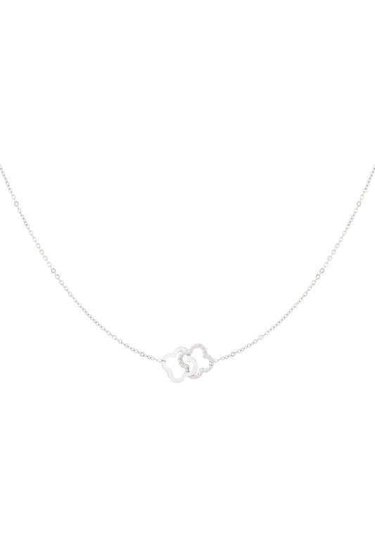 Silberne Edelstahl Halskette mit zwei verbundenen Kleeblättern.