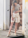 Shorts florales Muster Beige mit Spitzenrand