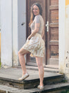 Shorts florales Muster Beige mit Spitzenrand
