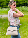 edle Handtasche mit Goldkette und Wildleder Optik