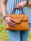 edle Handtasche mit Goldkette und Wildleder Optik
