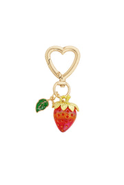 Roter Schlüsselanhänger in Erdbeerfom mit grünem Blatt und herzförmigen goldenen Karabiner.